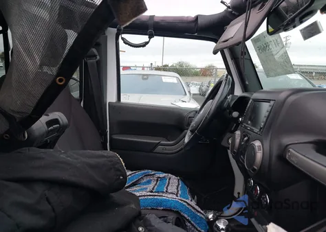 2015 Jeep Wrangler Unlimited Willys Wheeler из США, поврежденный, VIN 1C4BJWDG4FL564614